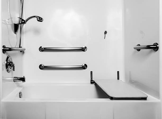 The fold down seat helps the disabled and handicap use the shower easier with access at the height of a wheelchair. The adjustable shower handle allows multiple heights for use. The wall handles help with accessibility.